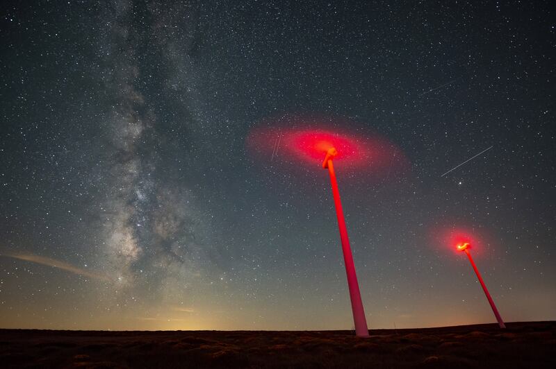 The Milky Way over the windmills at the wasteland of La Lora, in Rocamundo, northern Spain. EPA