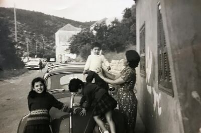 The young Mona, left, with her mother and siblings in Beirut in the 1960s.