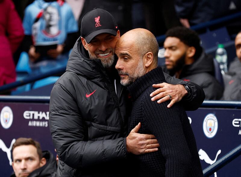 Jurgen Klopp, left, and Pep Guardiola will face each other for possibly the last time in the Premier League when Liverpool host Manchester City on Sunday. Reuters