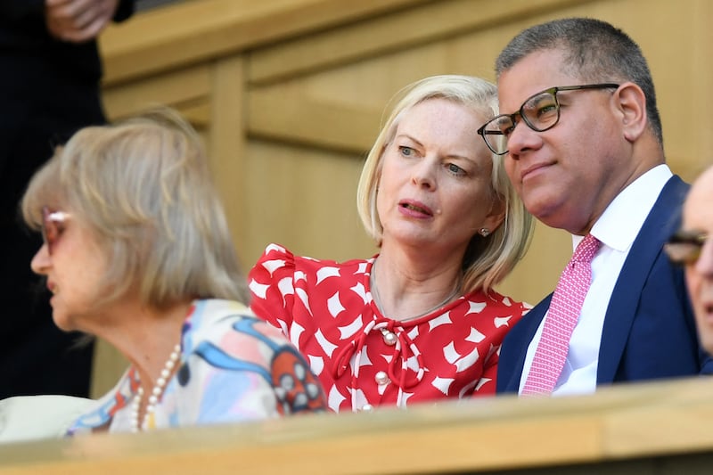 British MP Alok Sharma and his wife Ingela attend the men's singles semi-final tennis match between Britain's Cameron Norrie and Serbia's Novak Djokovic at Wimbledon. AFP