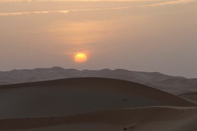 Abu Dhabi, United Arab Emirates. April 14/15, 2014///

The sunset while on the camel trekking activity. A day in the life of Mohammad Ashfaq, an adventure guide at the Qasr Al Sarab resort. Abu Dhabi, United Arab Emirates. 
Mona Al-Marzooqi/ The National 

Reporter: Lianne Gutcher 
Section: Business 
