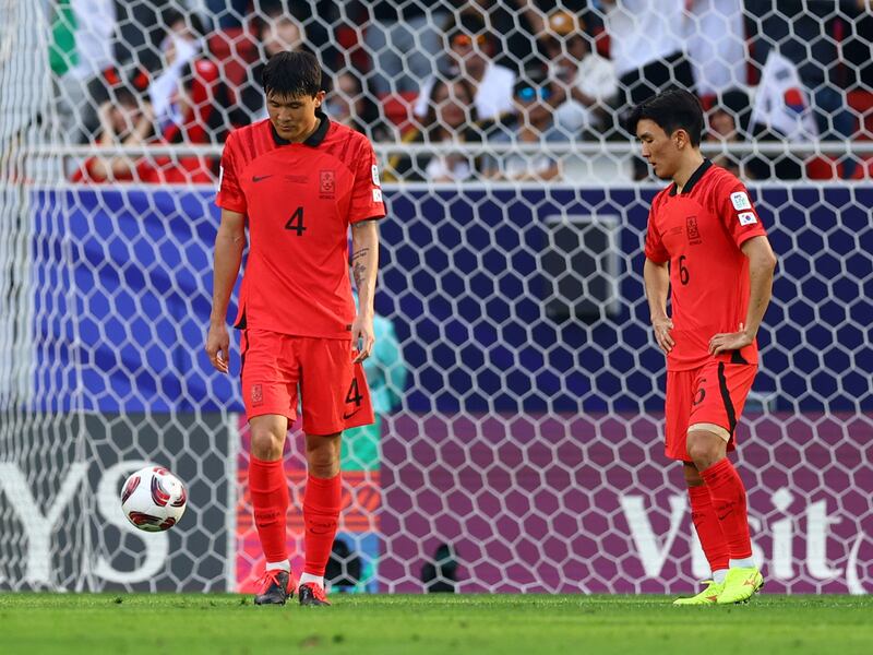 South Korea's Kim Min-jae looks dejected after Jordan's Yazan Al Naimat scores their second goal. Reuters
