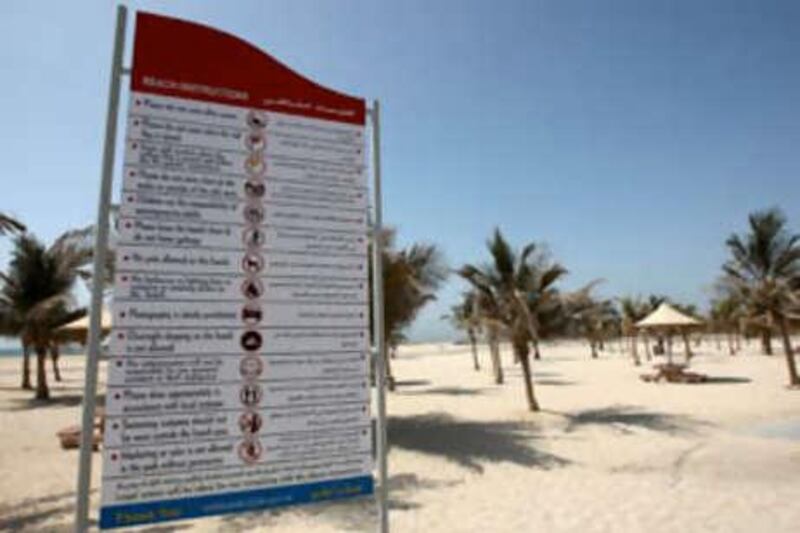 DUBAI, UNITED ARAB EMIRATES- Sep 4:  New Beach Instructions Sign Board put up by Dubai Municipality at Jumeirah open beach in Dubai. ( Pawan Singh / The National )

Story by Salam