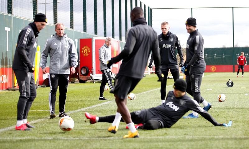 Manchester United manager Ole Gunnar Solskjaer looks on during training. All photos by Reuters