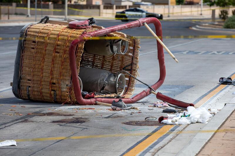 The basket of a hot air balloon which crashed lies on the pavement in Albuquerque, New Mexico. AP Photo