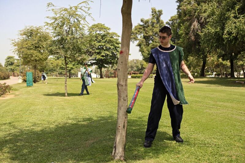 Zebbediah Jones, 16, practices his sword technique in Safa Park in Dubai.