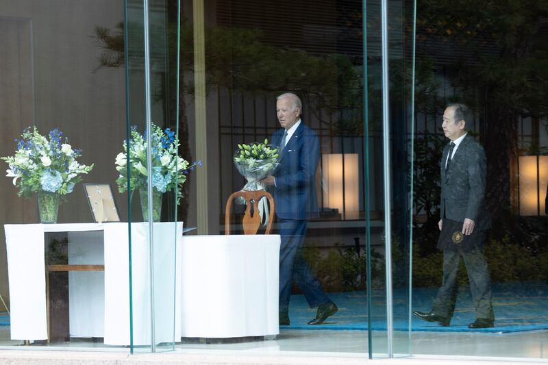 Mr Biden arrives at the Japanese embassy in Washington. EPA