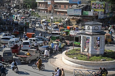 A general view of the crowded Raja Bazar is seen during a government-imposed nationwide lockdown as a preventive measure against the spread of the COVID-19 coronavirus, in Rawalpindi on May 5, 2020. (Photo by Aamir QURESHI / AFP)