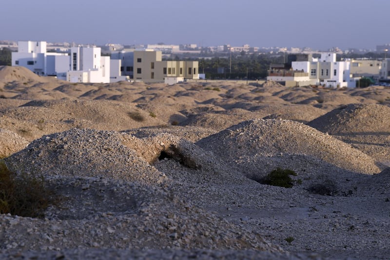 A picture taken  on July 2, 2019 shows the Dilmun Burial Mounds, near the village of Aali, south of the Bahraini capital Manama. (Photo by STR / AFP)