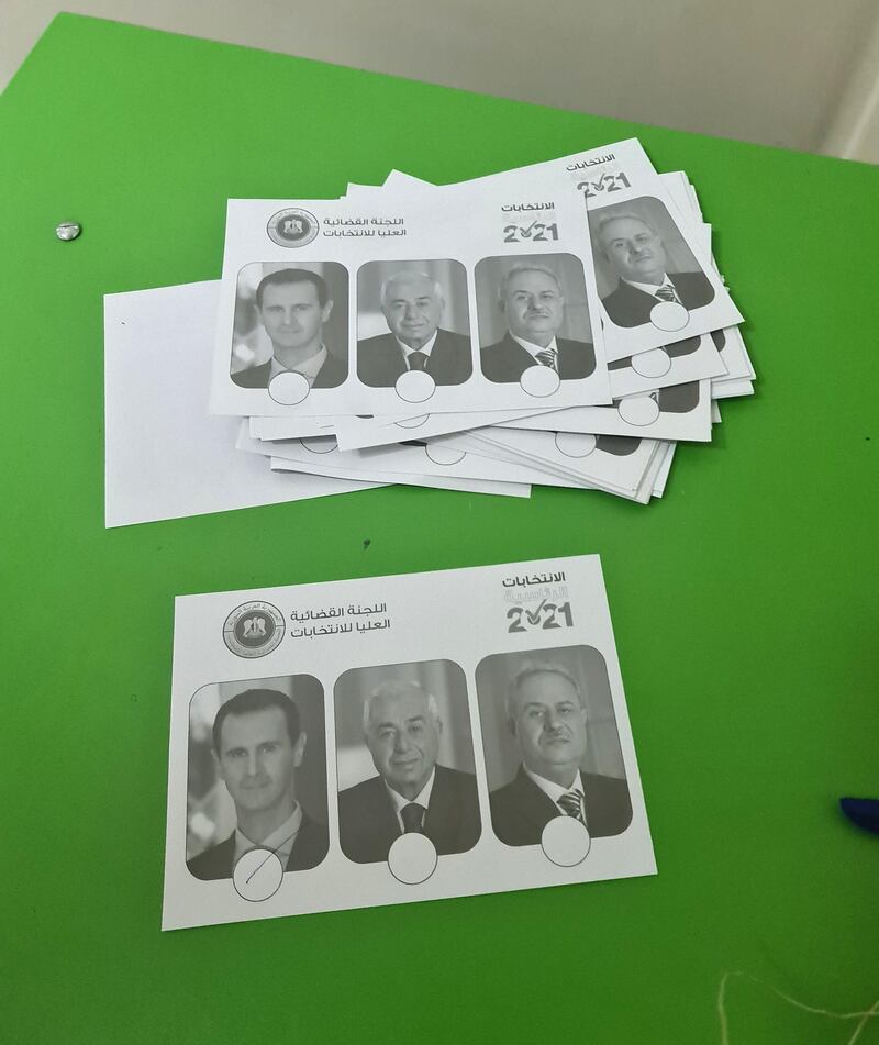 A photo card showing the election candidates.