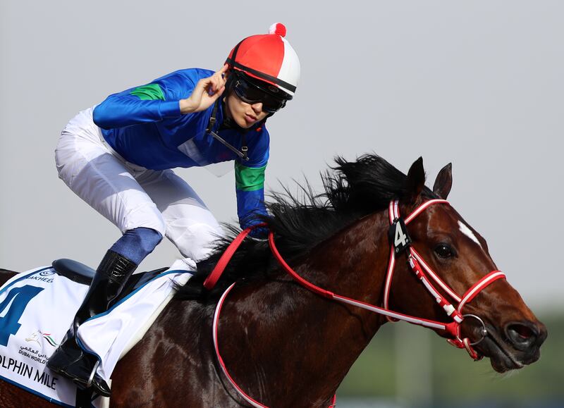  Ryusei Sakai celebrates on Bathrat Leon after winning the Godolphin Mile during The Dubai World Cup at Meydan racecourse on Saturday, March 26, 2022. Chris Whiteoak / The National