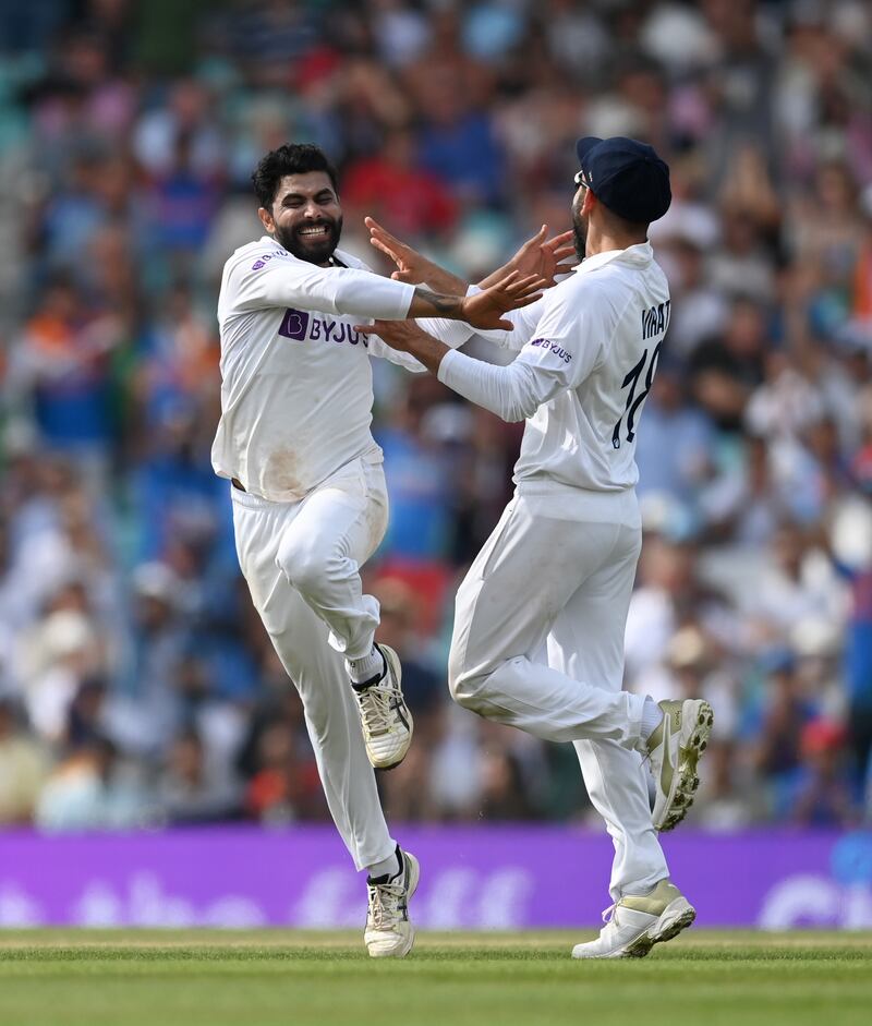 Ravindra Jadeja celebrates with Virat Kohli after dismissing Moeen Ali for a duck. Getty