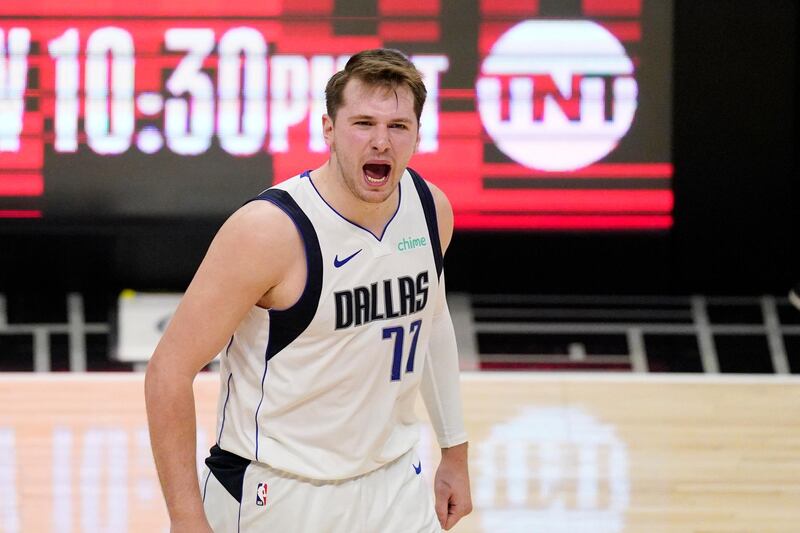 Dallas Mavericks guard Luka Doncic celebrates after they scored during the second half in Game 5 of an NBA basketball first-round playoff series against the Los Angeles Clippers Wednesday, June 2, 2021, in Los Angeles. (AP Photo/Mark J. Terrill)