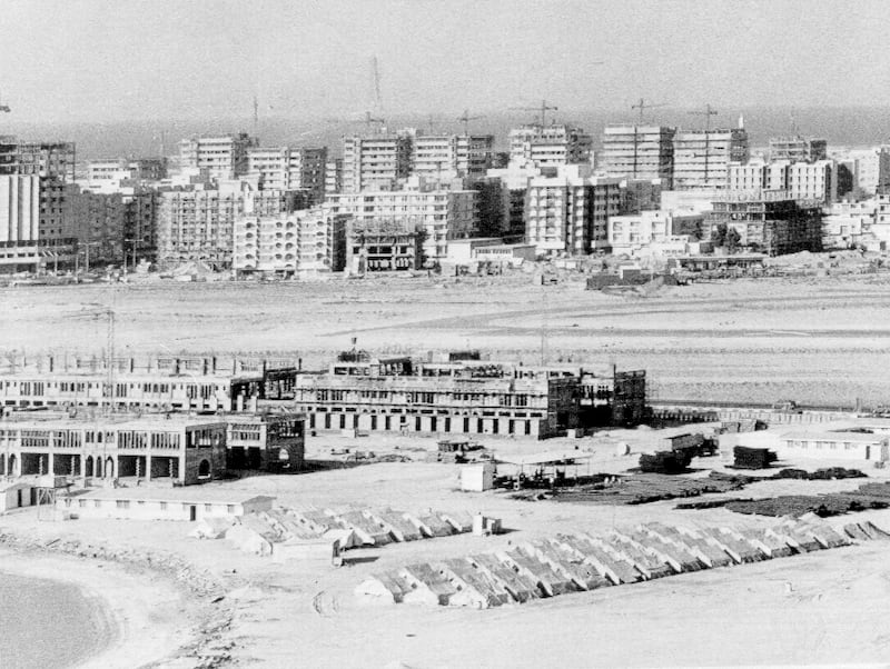 High rise buildings and hotels sprout on the sandy shore of Sharjah during its transformation from fishing town to major city in 1977. AP