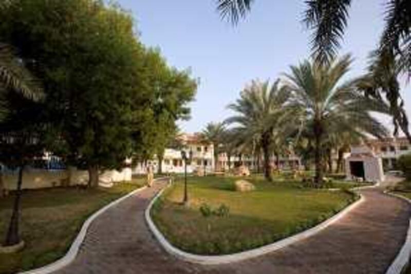 Umm Al Quwain - December 27, 2008 - A guest walks along a path on the grounds of the Flamingo Resort in Umm Al Quwain, December 27, 2008. (Photo by Jeff Topping/ The National )

 *** Local Caption ***  JT004-1227-FLAMINGO RESORT IMG_2202.jpgJT004-1227-FLAMINGO RESORT IMG_2202.jpg