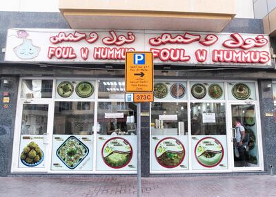 DUBAI, UNITED ARAB EMIRATES. 29 JULY 2019. 
Foul w Hummus restaurant in Barsha has placed a sign saying “If you can’t buy this food, it’s free, this is a gift from Allah”

(Photo: Reem Mohammed/The National)

Reporter:
Section: