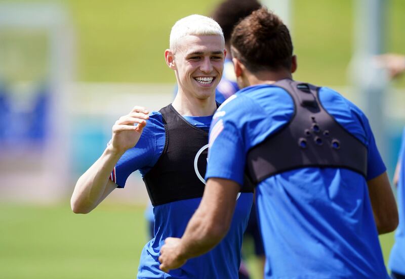 England's Phil Foden, left, with Dominic Calvert-Lewin  during a training session.