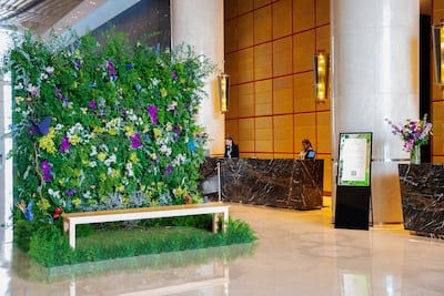 The hotel lobby has a 10-foot wall of floral beauty; the smell of fresh flowers makes for a wonderful entrance. Photo: InterContinental Dubai Festival City