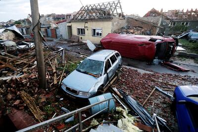 A view shows debris and damaged cars in the aftermath of a rare tornado that struck and destroyed parts of some towns, in Moravska Nova Ves village, Czech Republic, June 25, 2021. REUTERS/David W Cerny