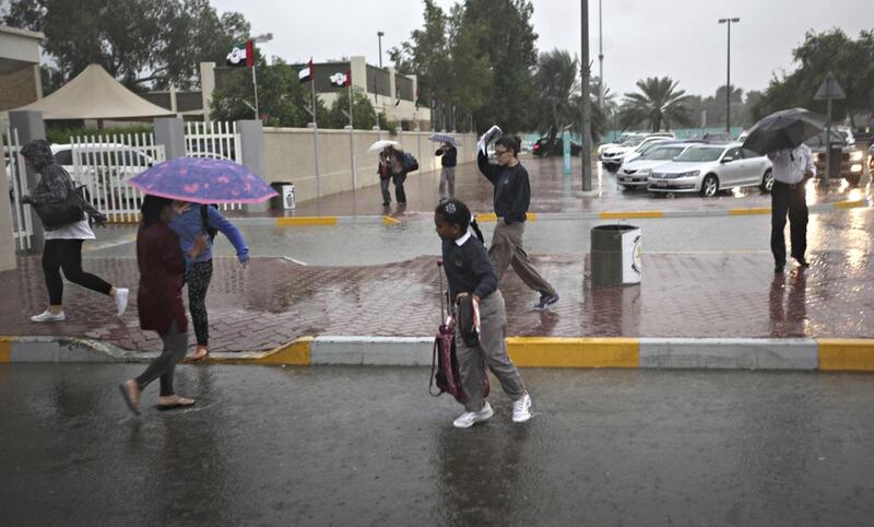 Heavy rain swept over Abu Dhabi Thursday morning as commuters went to work and school. Sammy Dallal / The National 



