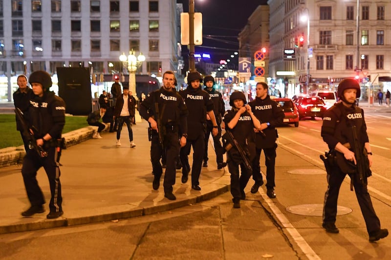 Armed police arrive at the first district near the state opera in central Vienna, following a shooting near a synagogue.  AFP