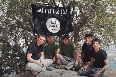 This grab taken from ISIS video shows five men in Tajikistan declaring allegiance to ISIS leader Abu Bakr al-Baghdadi in July 2018. AP