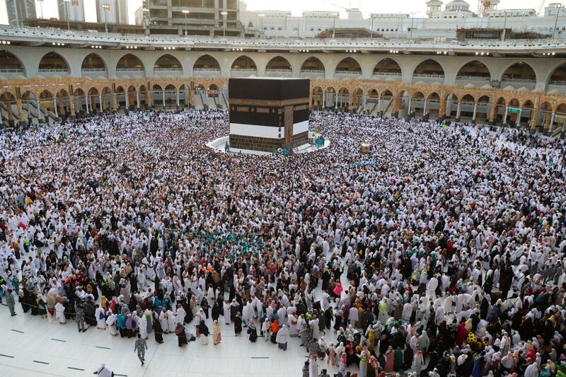 Worshippers arrive at the Grand Mosque. AFP