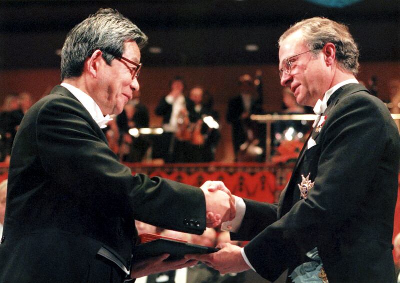Kenzaburo Oe, left, receives the Nobel Prize for Literature from Swedish King Carl XVI Gustaf in Stockholm, in 1994. AP Photo