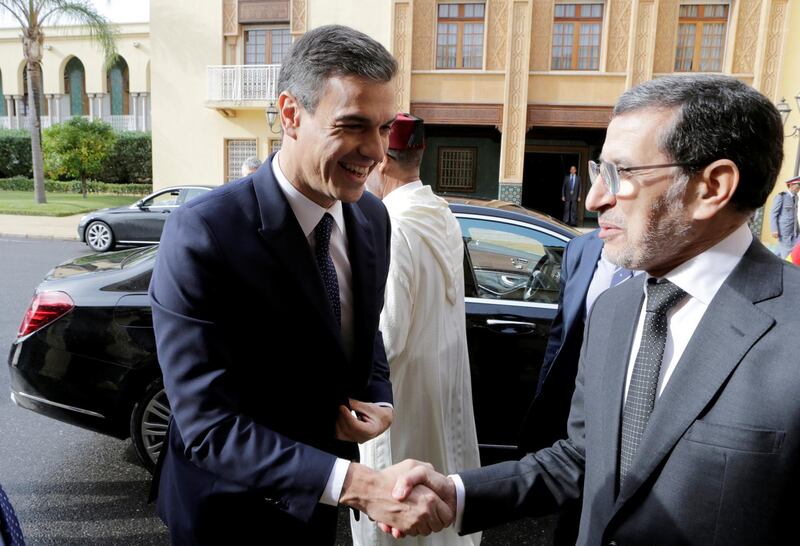 Spain's Prime Minister Pedro Sanchez shakes hands with Morocco's Prime Minister Saad Eddine El Othmani in Rabat, Morocco. Reuters
