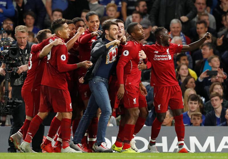 Soccer Football - Premier League - Chelsea v Liverpool - Stamford Bridge, London, Britain - September 29, 2018  Liverpool's Daniel Sturridge celebrates scoring their first goal with team mates             Action Images via Reuters/John Sibley  EDITORIAL USE ONLY. No use with unauthorized audio, video, data, fixture lists, club/league logos or "live" services. Online in-match use limited to 75 images, no video emulation. No use in betting, games or single club/league/player publications.  Please contact your account representative for further details.