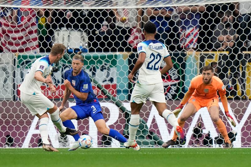 England captain Harry Kane shoots for goal but the strike is deflected out for corner. AP