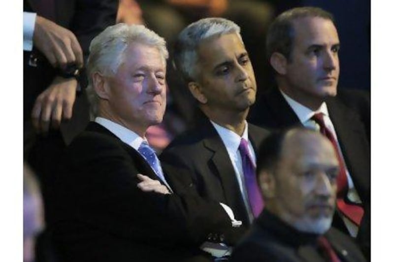 Bill Clinton, left, the former US president, and Sunil Gulati, chairman of the US bid committee, look rueful after hearing that Qatar had won the right to host the 2022 World Cup.

 Steffen Schmidt / AP Photo