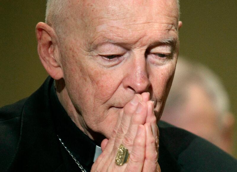 FILE - In this Nov. 14, 2011, file photo, then Cardinal Theodore McCarrick prays during the United States Conference of Catholic Bishops' annual fall assembly in Baltimore. In a document, Archbishop Carlo Maria Vigano denounced the official Vatican silence about his claims and accused Pope Francis of mounting a campaign of "subtle slander" against him. He urged the head of the Vatican bishops office to speak out, saying he has all the documentation needed to prove years of cover-up of allegations of sexual misconduct of ex-Cardinal McCarrick. (AP Photo/Patrick Semansky, File)