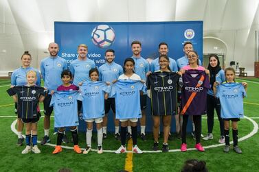 Elle Charney, (far left), City Football Schools UAE's first female coach, was delighted with the response to the launch of a new campaign to get more girls to give football a try. 