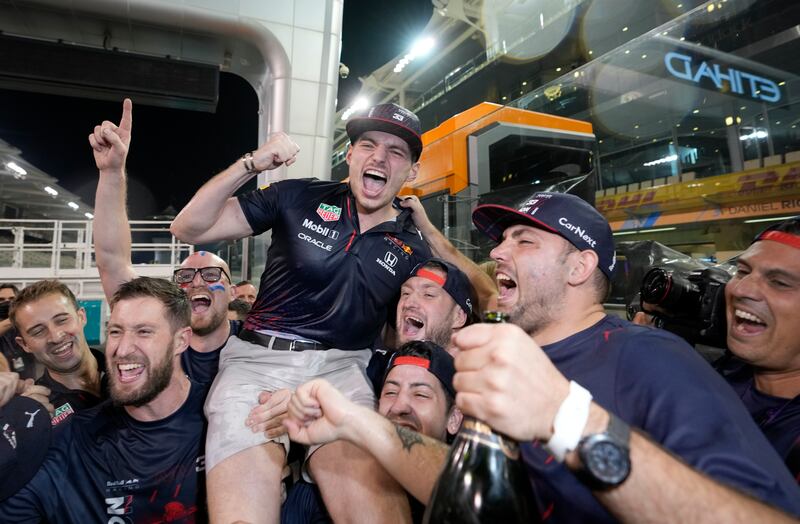 The Red Bull team celebrate Max Verstappen's controversial victory at the 2021 Etihad Airways Abu Dhabi Grand Prix. AP Photo