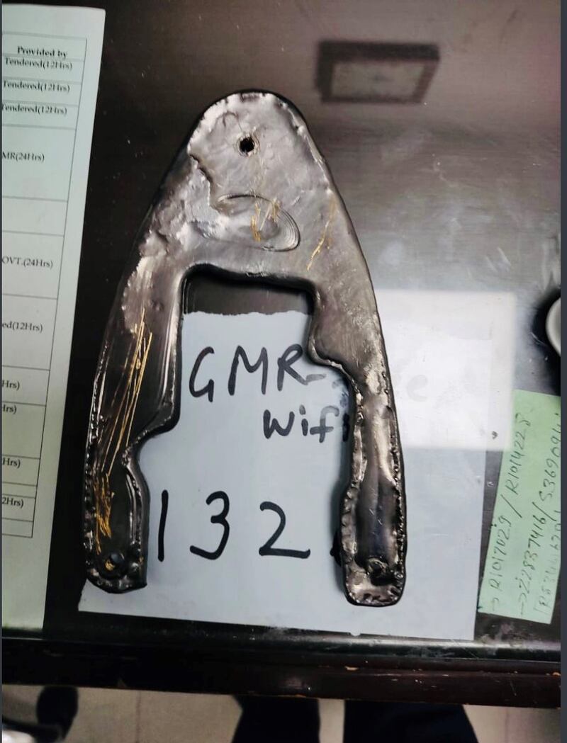 An Indian passenger arriving from Dubai was arrested by customs officials in Delhi for trying to smuggle almost 700 grams of gold hidden inside an electric iron. Photo: Delhi Customs