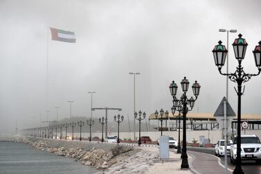 Abu Dhabi, United Arab Emirates - November 10, 2019: Dark clouds and rain batter the Abu Dhabi Coast. Sunday the 10th of November 2019. Abu Dhabi. Chris Whiteoak / The National