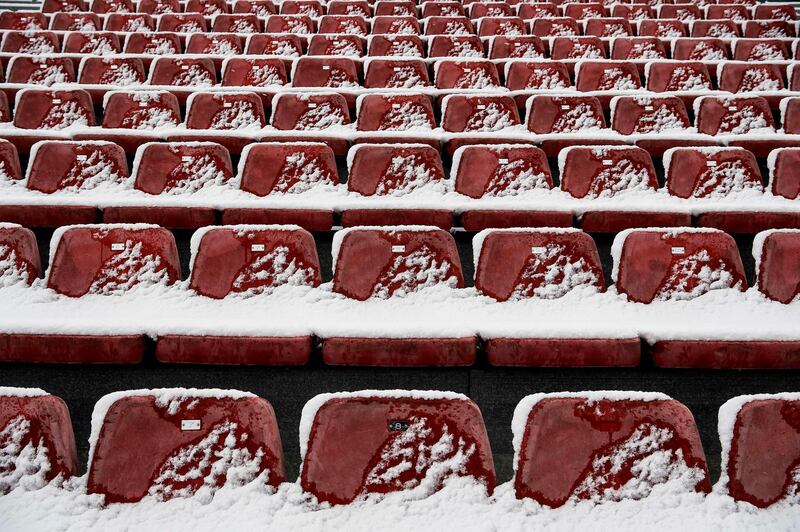 Snow covers tribune seats after a snowfall at the Circuit de Catalunya. Josep Lago / AFP