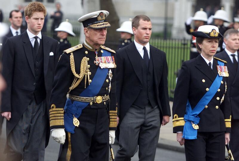 403594 01: (L to R) Britain's Prince Harry, Prince Phillip, Peter Phillips and Princess Anne walk behind the Royal coffin at the State Funeral of the Queen Mother April 9, 2002 outside Westminster Abbey in London. (Photo by Michael Crabtree/Getty Images)