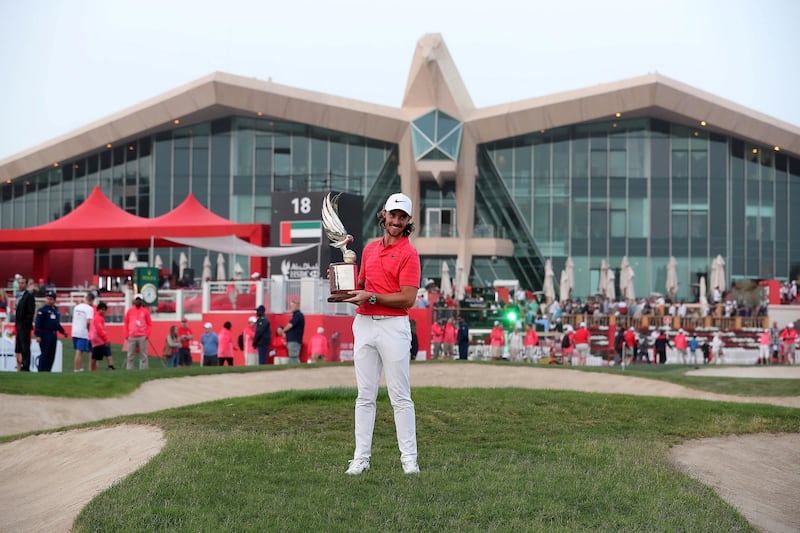 ABU DHABI , UNITED ARAB EMIRATES , JAN 21 – 2018 :- Tommy Fleetwood with the trophy after winning the Abu Dhabi HSBC Golf Championship held at Abu Dhabi Golf Club in Abu Dhabi.  (Pawan Singh / The National) For Sports. Story by Paul Radley