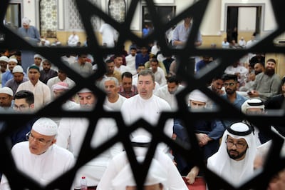 Worshipers during Eid prayers on Wednesday morning at Al Farooq Omar Bin Al Khattab Mosque in Dubai. Pawan Singh / The National