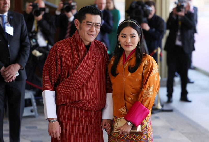 Bhutan's King Jigme Khesar Namgyel Wangchuck and Queen Jetsun Pema arrive at the reception at Buckingham Palace. Reuters
