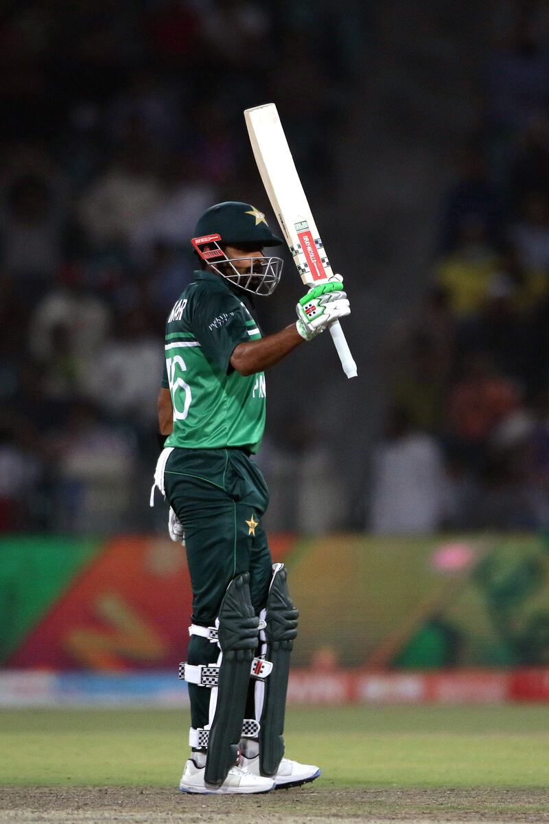 Pakistan's Babar Azam celebrates his a half century on his way to a score of 114 off 83 balls during the second One Day International between Pakistan and Australia at the Gaddafi Cricket Stadium in Lahore, Pakistan, on March 31, 2022. EPA