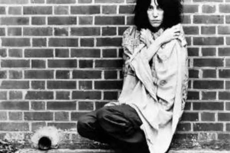 In his photo provided by Arista Records, singer Patti Smith poses for a portrait in January 1977. AP /Arista Records

REF al02PattiSmith 02/07/08