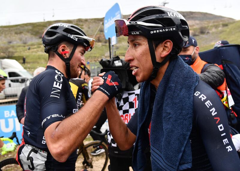 Egan Bernal celebrates with his Italian teammate Gianni Moscon. EPA