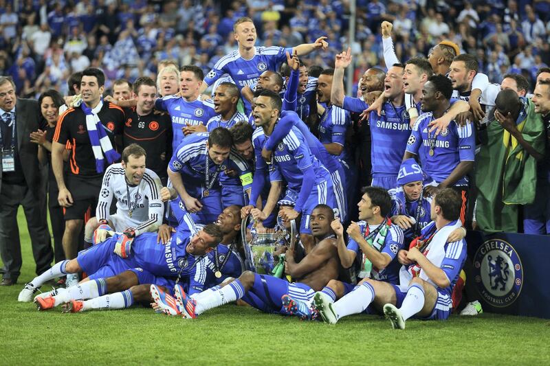 MUNICH, GERMANY - MAY 19:  Chelsea players celebrate with the trophy after their victory in the UEFA Champions League Final between FC Bayern Muenchen and Chelsea at the Fussball Arena MÃ¼nchen on May 19, 2012 in Munich, Germany.  (Photo by Alex Livesey/Getty Images)