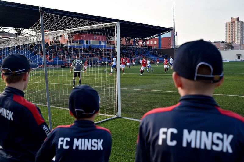 Supporters of FC Minsk attend the Belarus Championship match between FC Minsk and FC Dinamo-Minsk. AFP