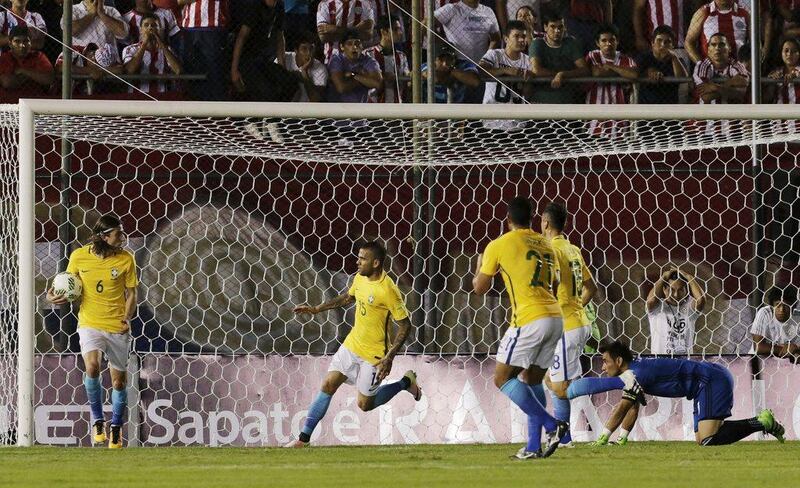 Dani Alves (2nd L) of Brazil celebrates his goal near teammates. REUTERS/Mario Valdez