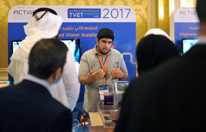 A student presents a self-operated water supply system that he worked on at the Technical and Vocational Education and Training Innovation Week event on Tuesday.  Delores Johnson / The National  