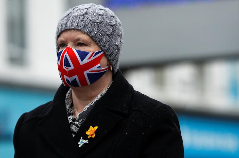 A person wears a Union Jack face mask in Newcastle Upon Tyne. Reuters